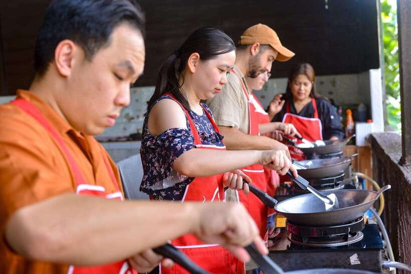 Ao Nang: Half-Day Thai Cooking Class Krabi Province - An open-air kitchen beside a temple