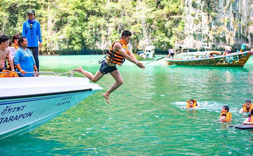 From Krabi: Maya Bay, Bamboo & Phi Phi Islands Day Tour - Pileh Lagoon’s clear water and limestone walls