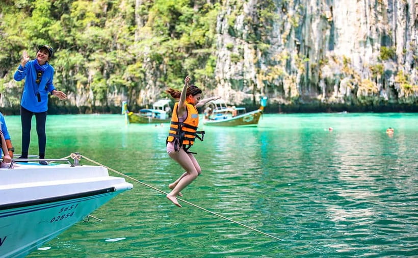 From Phi Phi: Sunset & Plankton Swim Tour By Speedboat - A six-hour trip with a night swim at its heart