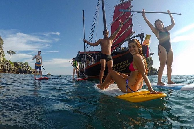 Krabi 4 Island Sunset Snorkeling Cruise + Bioluminescent Swim - A wooden junk changes the pace of the day