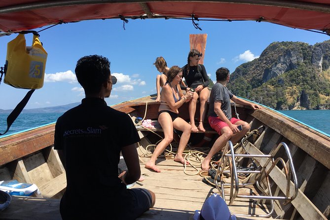 Krabi 4 Island Tour: Private Long-tail Boat Charter - Poda Island: beach time beneath the cliffs
