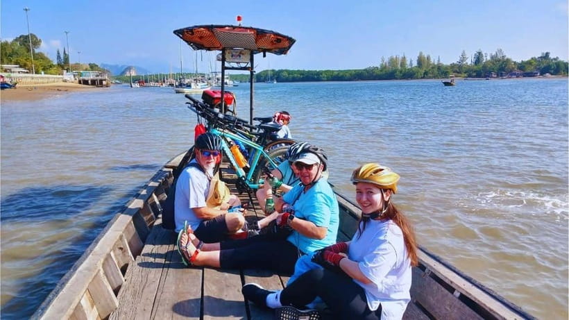 Krabi: Half-Day Koh Klang Culture Cycling Tour with Transfer - The short boat ride changes the pace