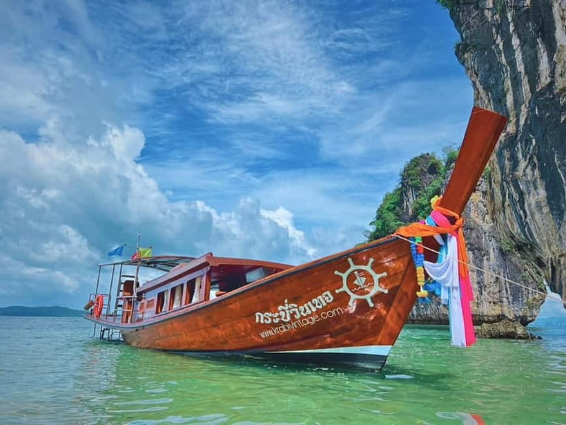 Krabi: Railay Phra Nang & Diamond Cave Sunset Plankton Tour - The boat ride through Phai Plong Bay